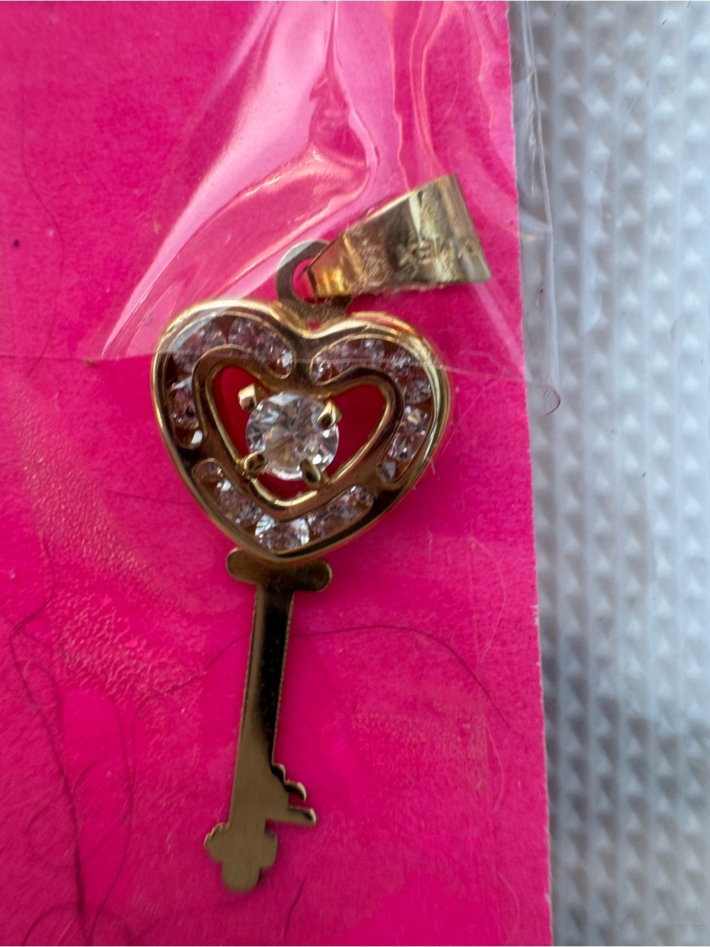10K stamped and acid tested Gold Heart Key Pendant with AAA CZ Stones